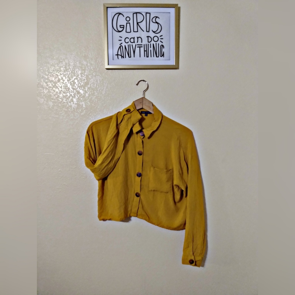 top button shirt style, it's short and mustard